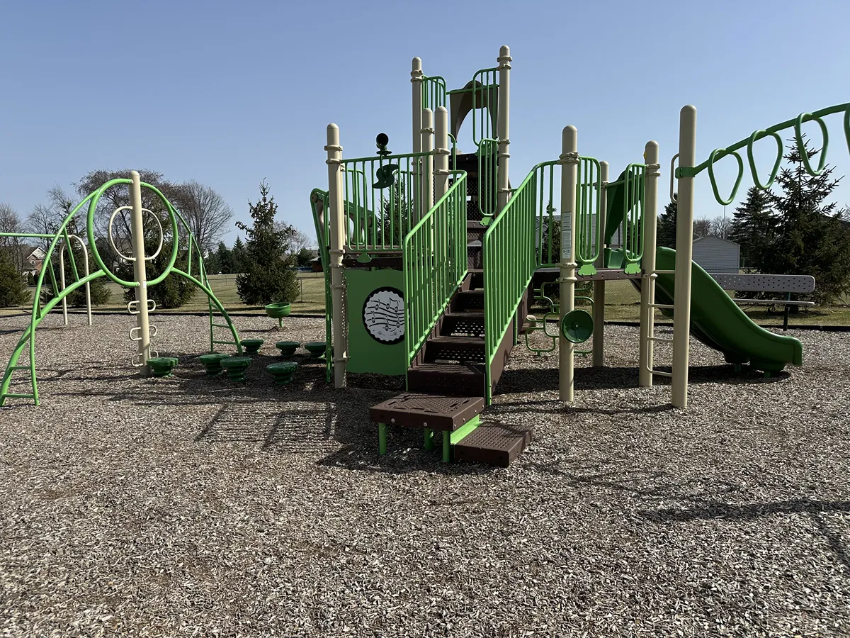 Artificial playground turf