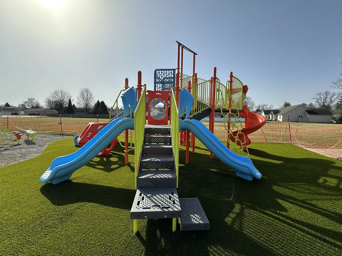 Artificial playground turf