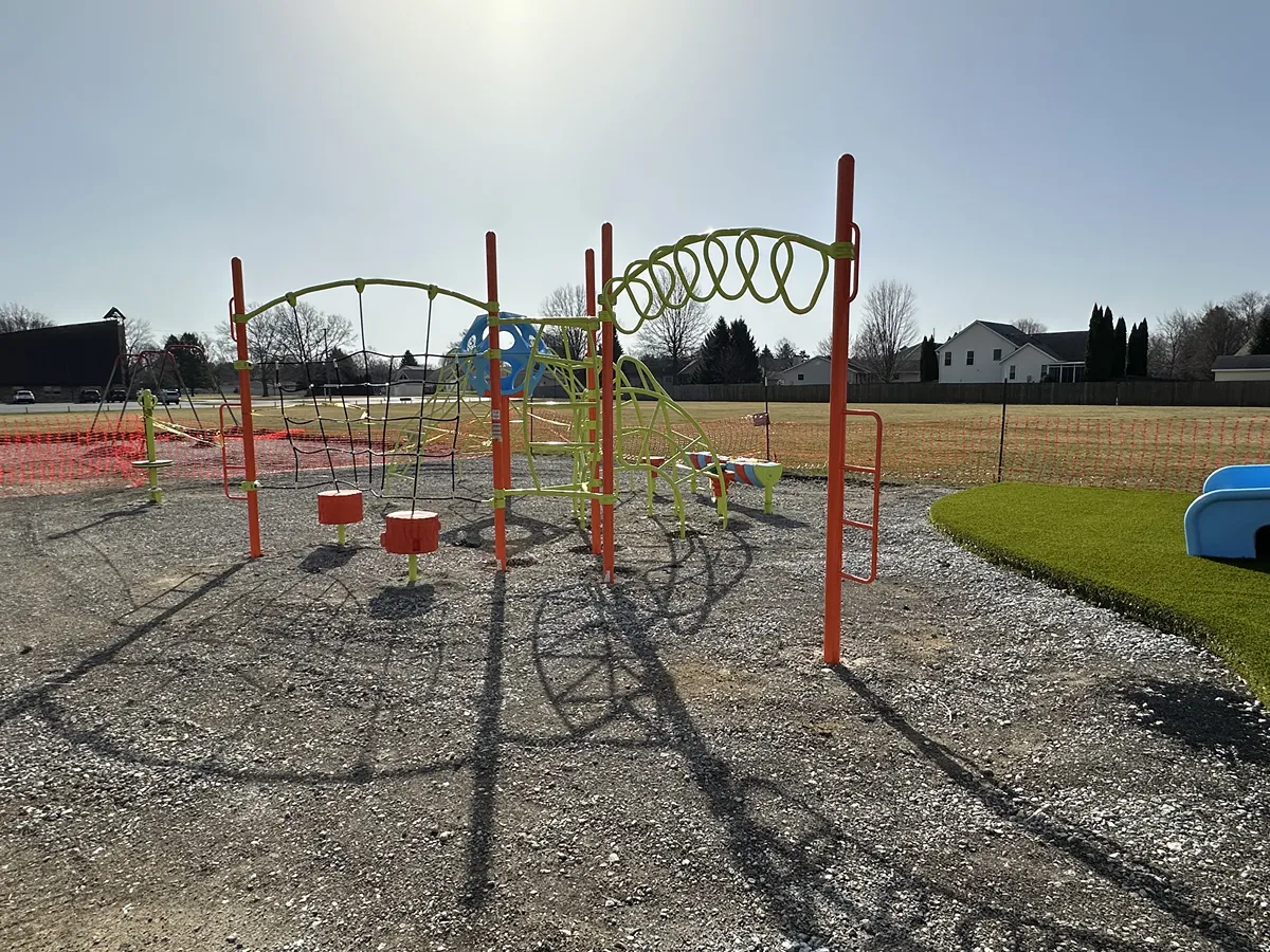 Artificial playground turf