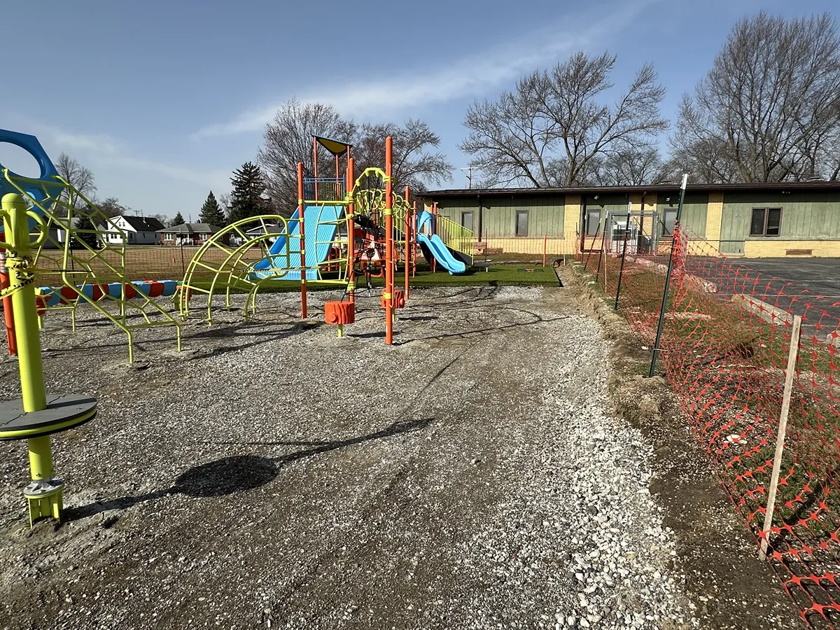 Artificial playground turf