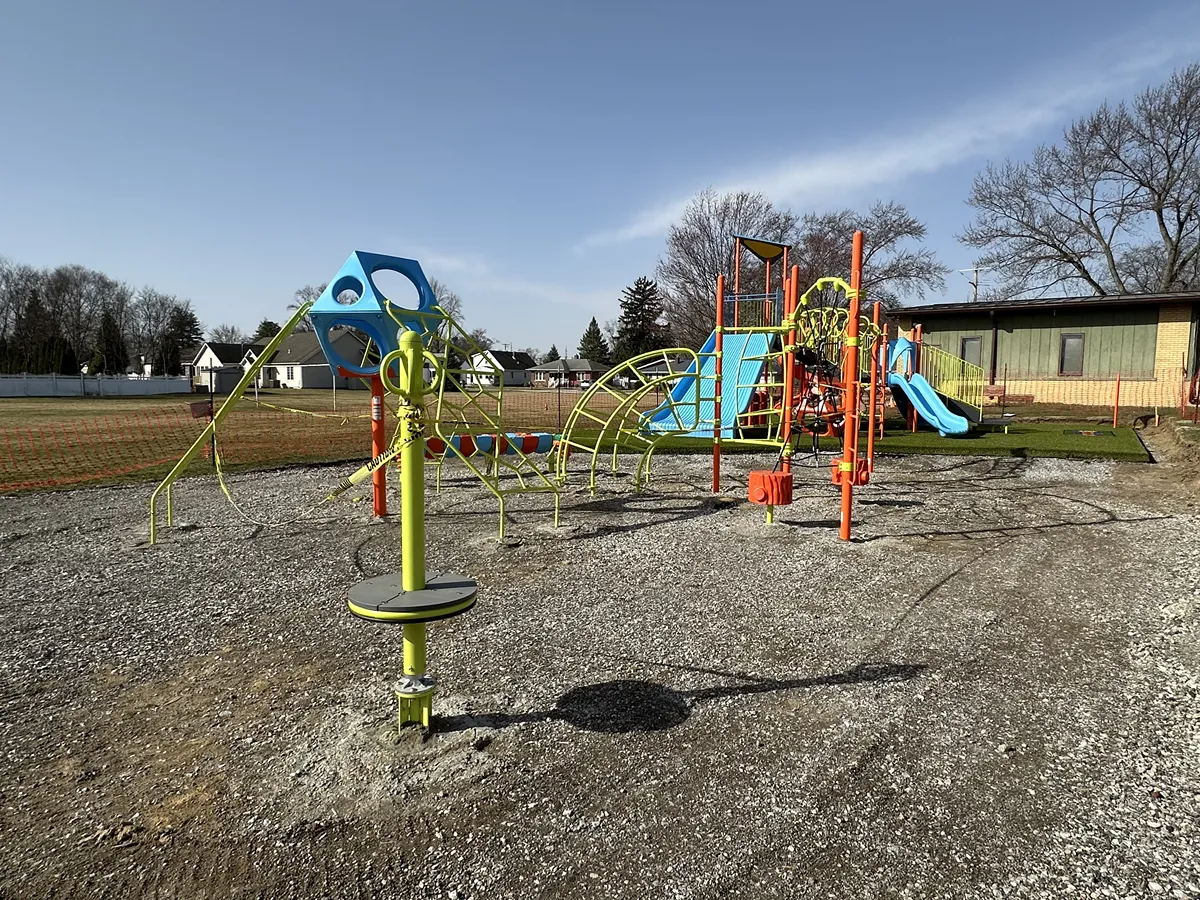 Artificial playground turf