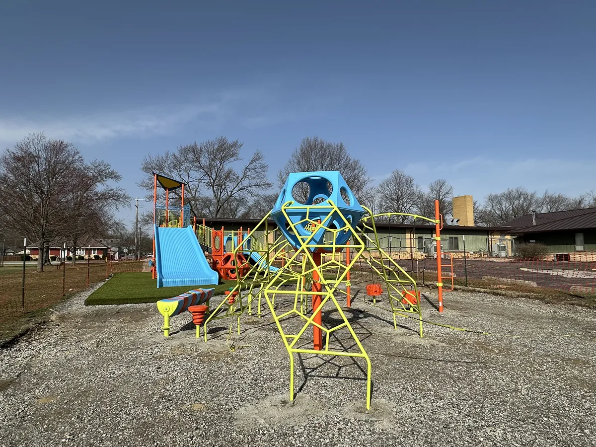 Artificial playground turf
