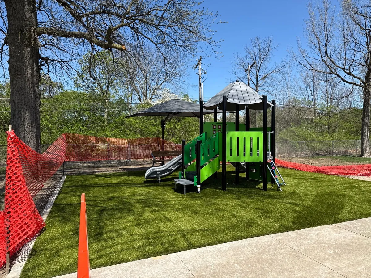 Artificial playground turf
