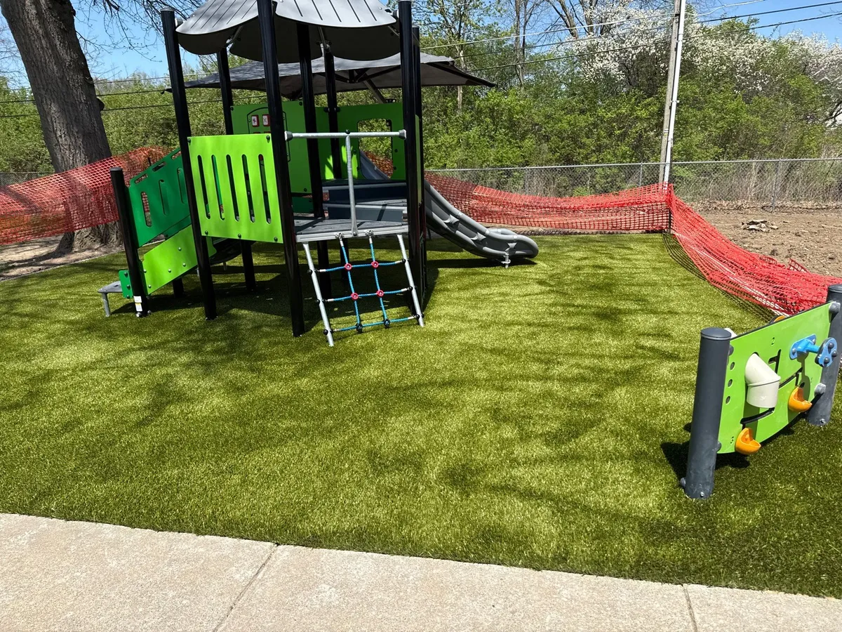 Artificial playground turf