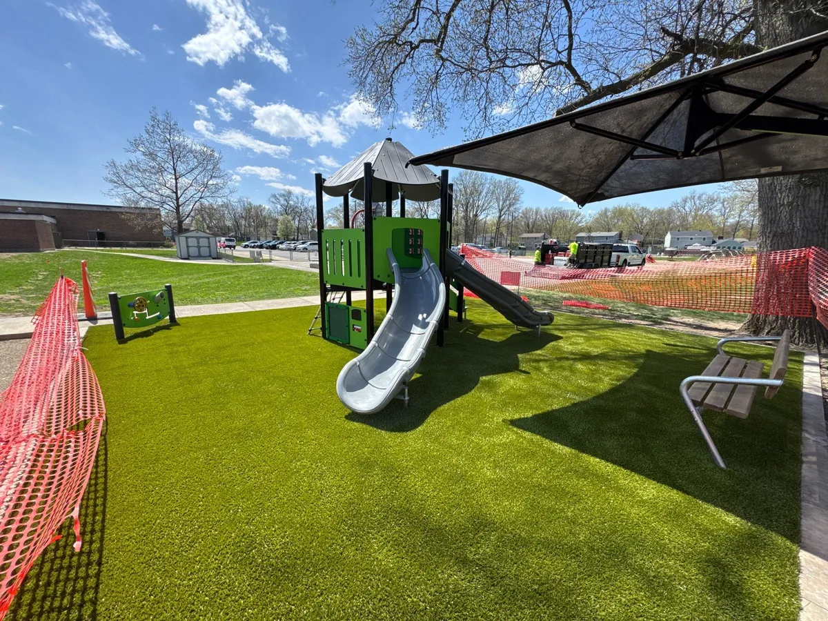 Artificial playground turf