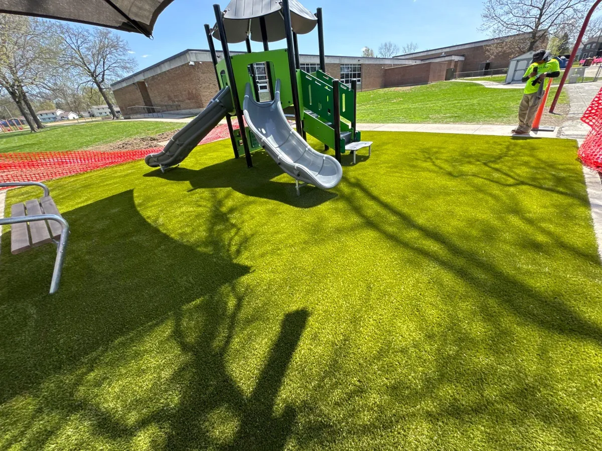 Artificial playground turf