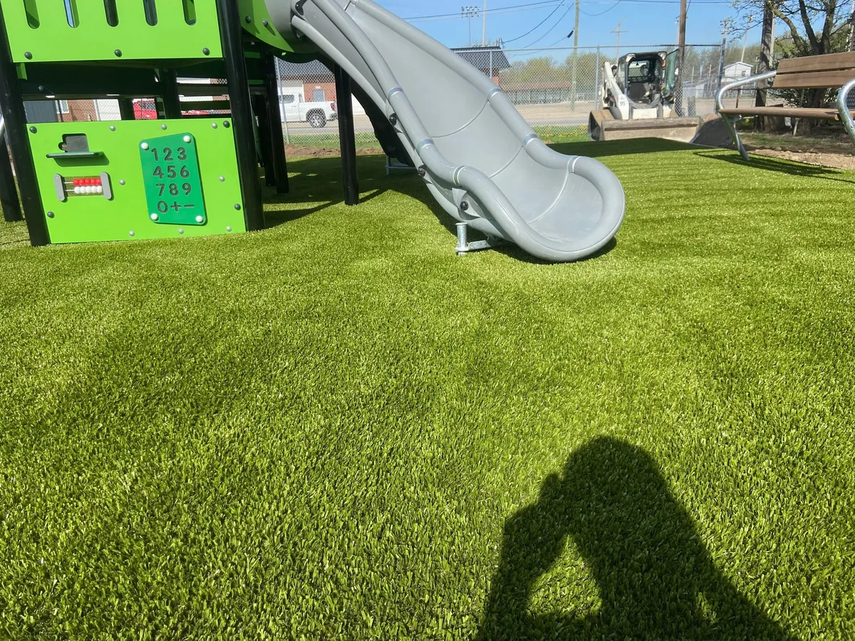 Artificial playground turf