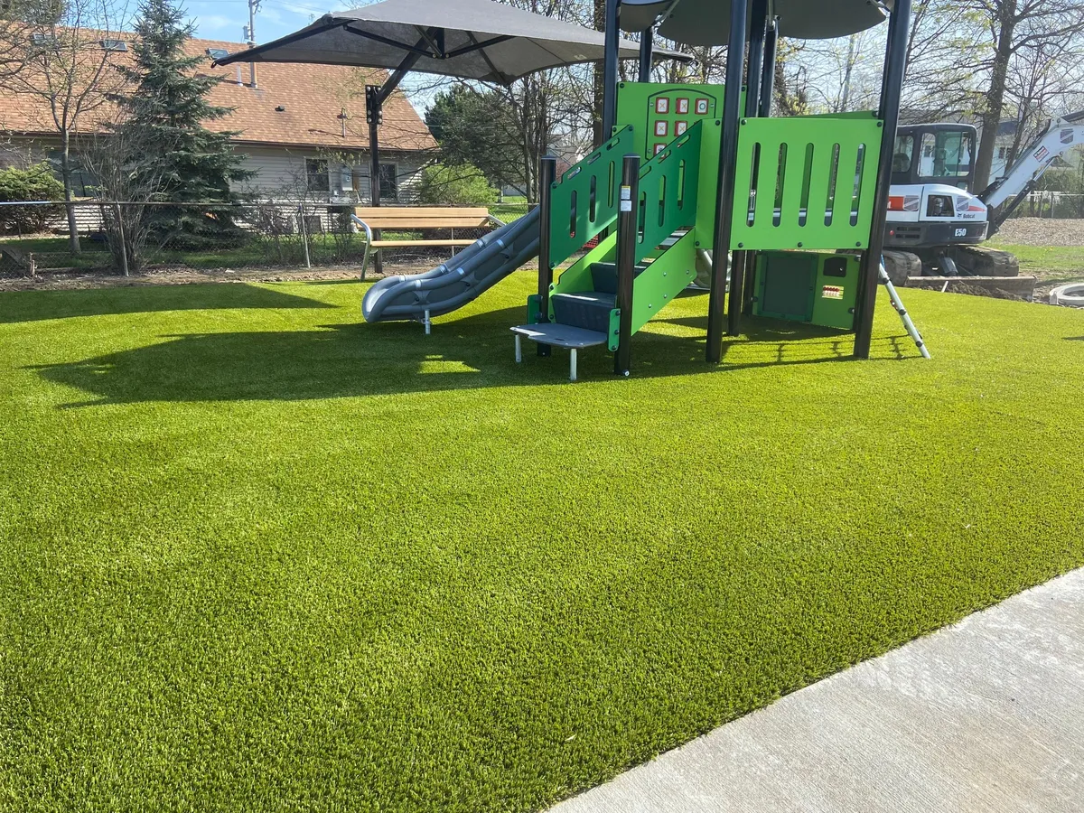 Artificial playground turf