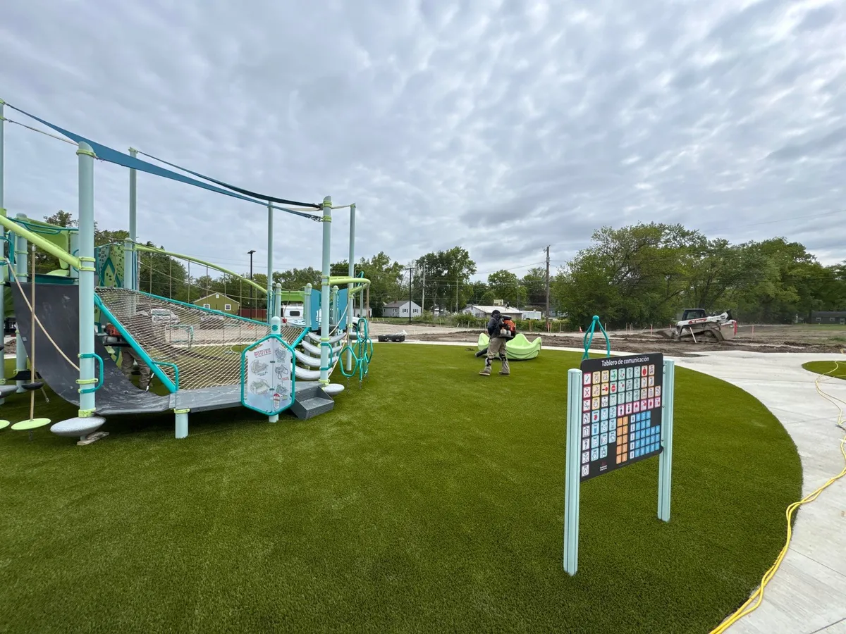 Artificial playground turf