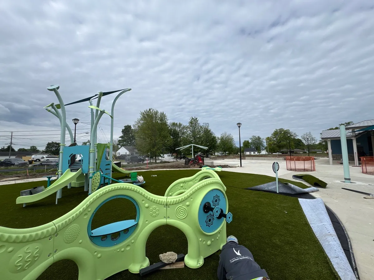 Artificial playground turf