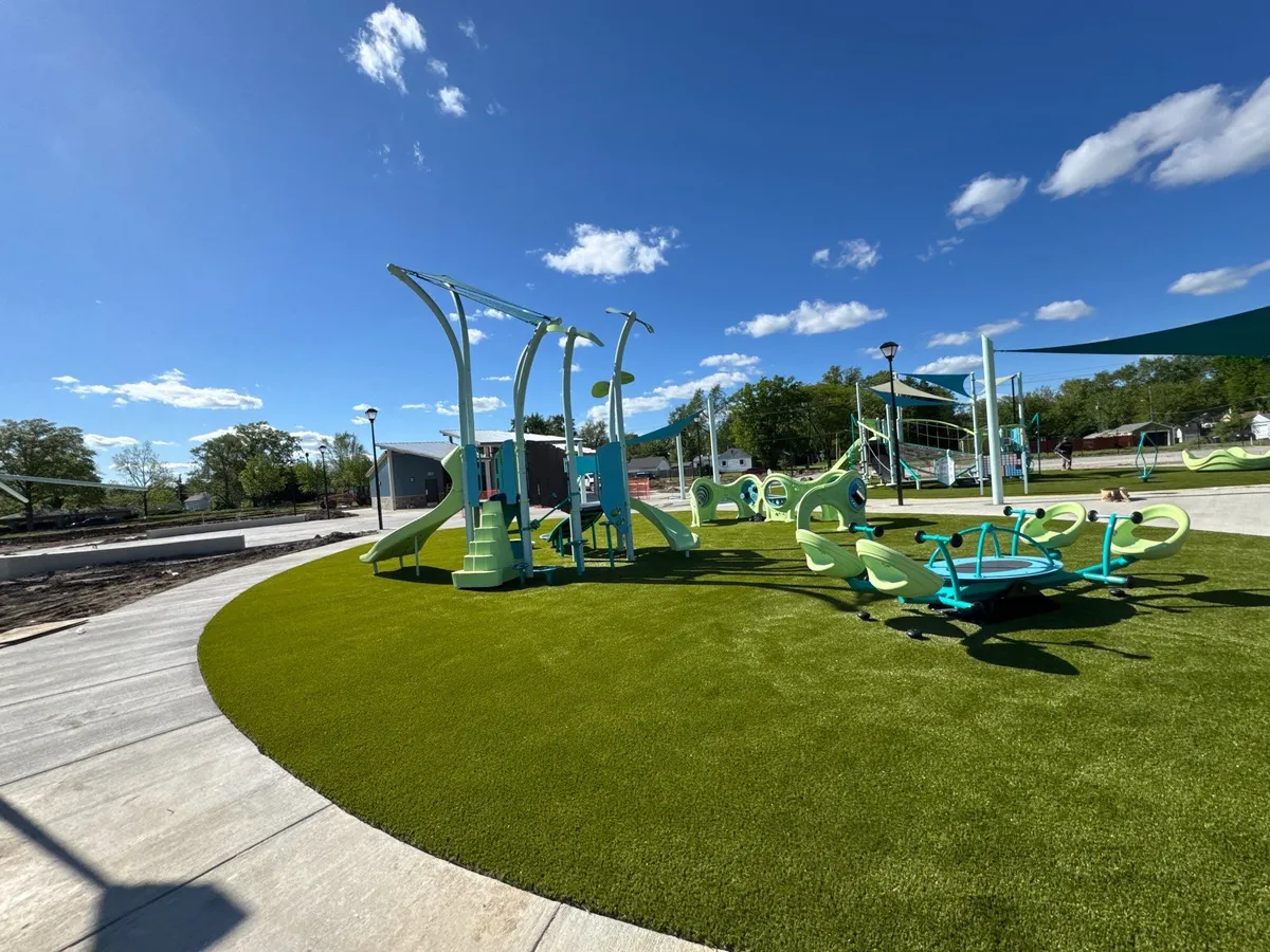 Artificial playground turf