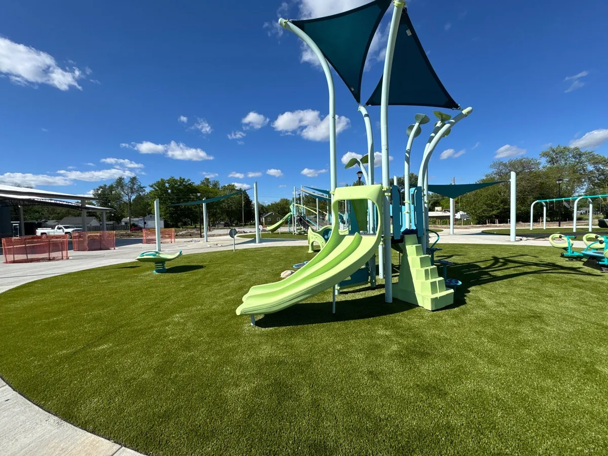 Artificial playground turf