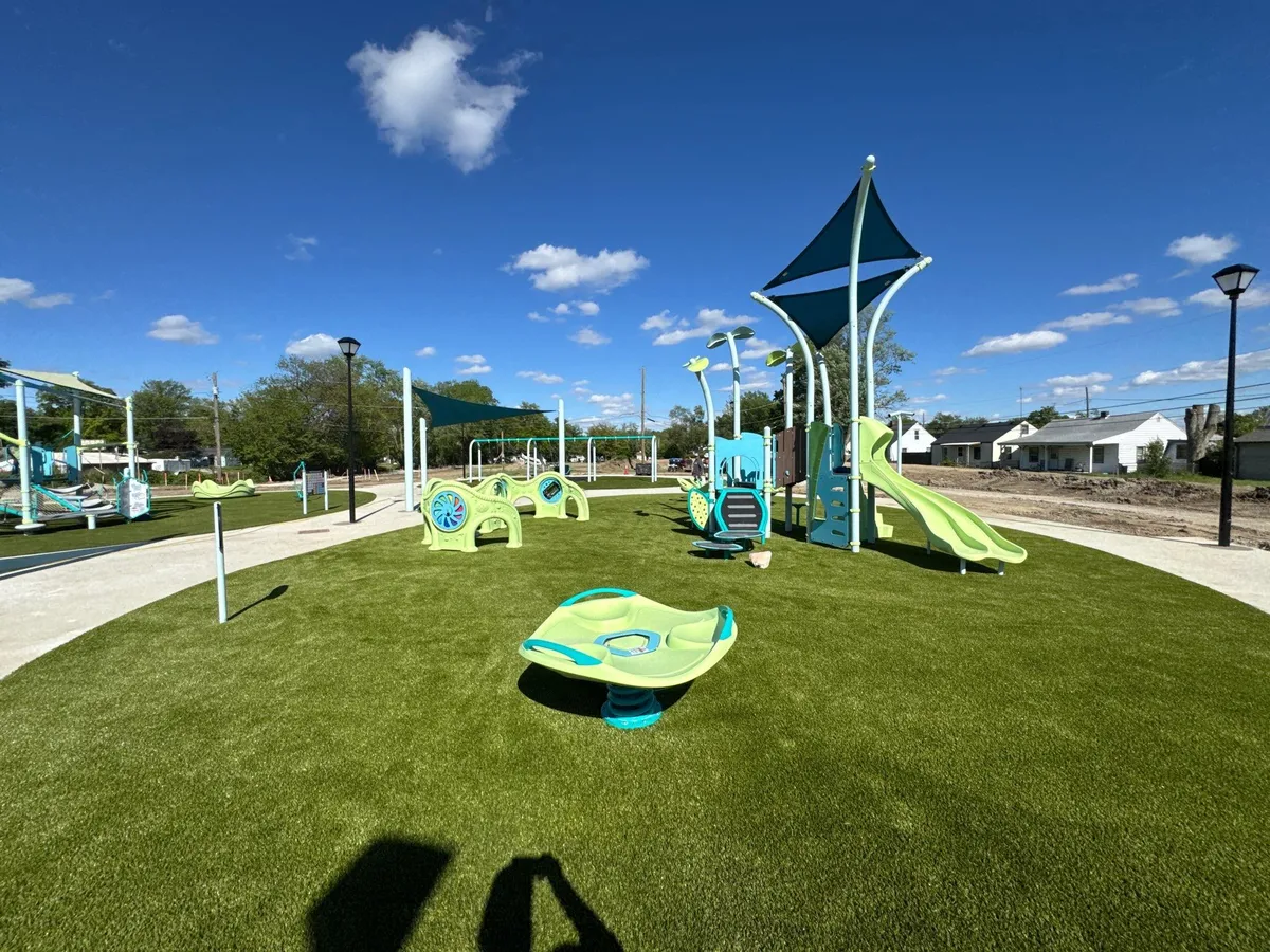 Artificial playground turf