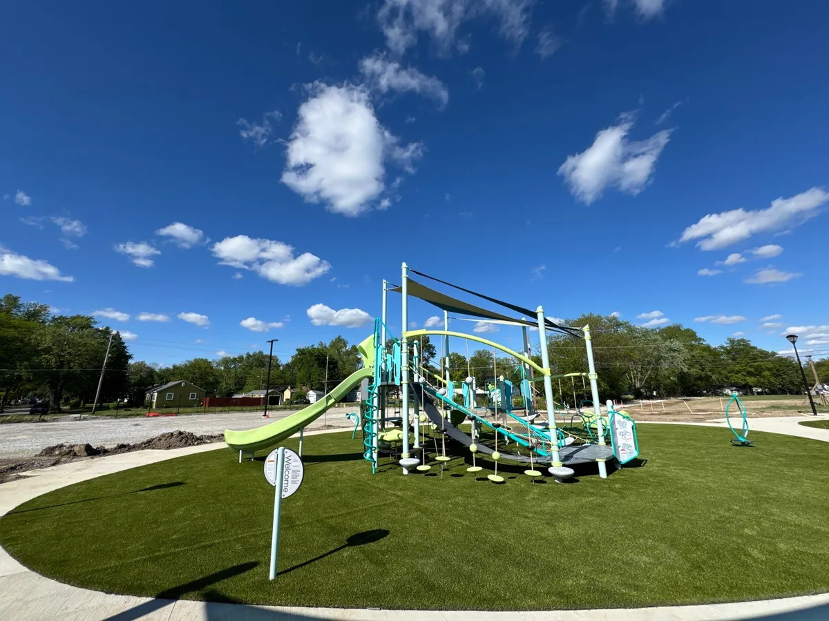 Artificial playground turf