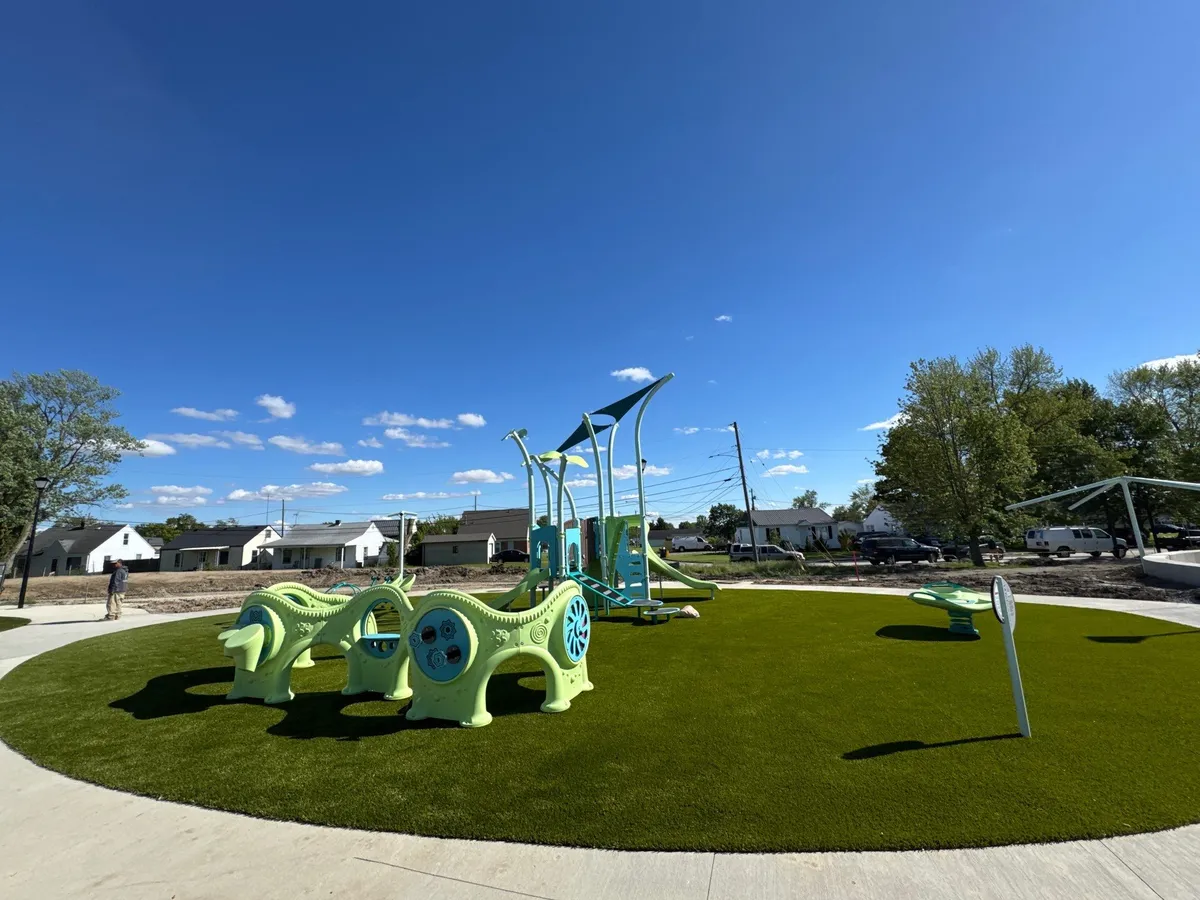 Artificial playground turf