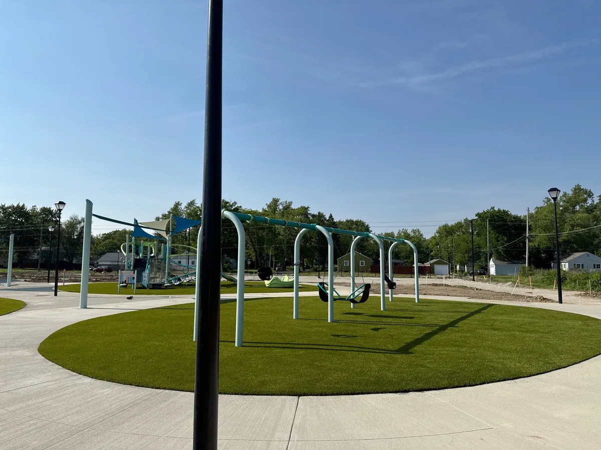 Artificial playground turf