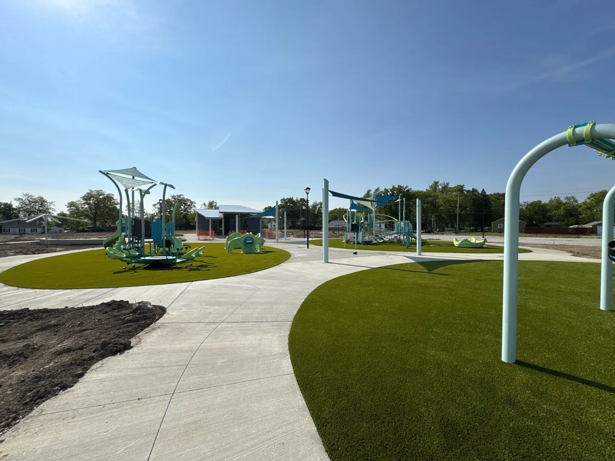 Artificial playground turf