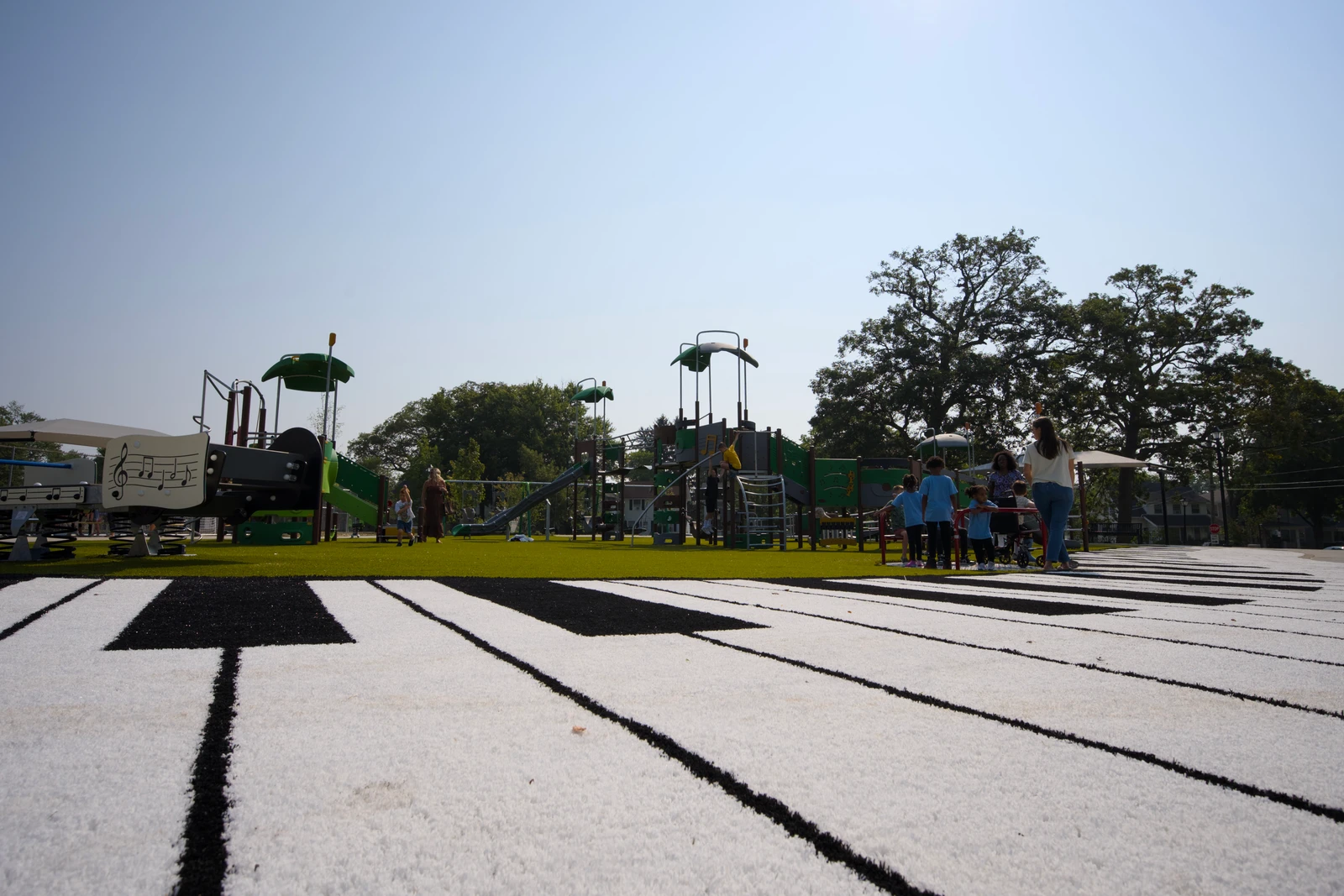Featured image for “Packard Park Piano Keys Playground Grass Installation”