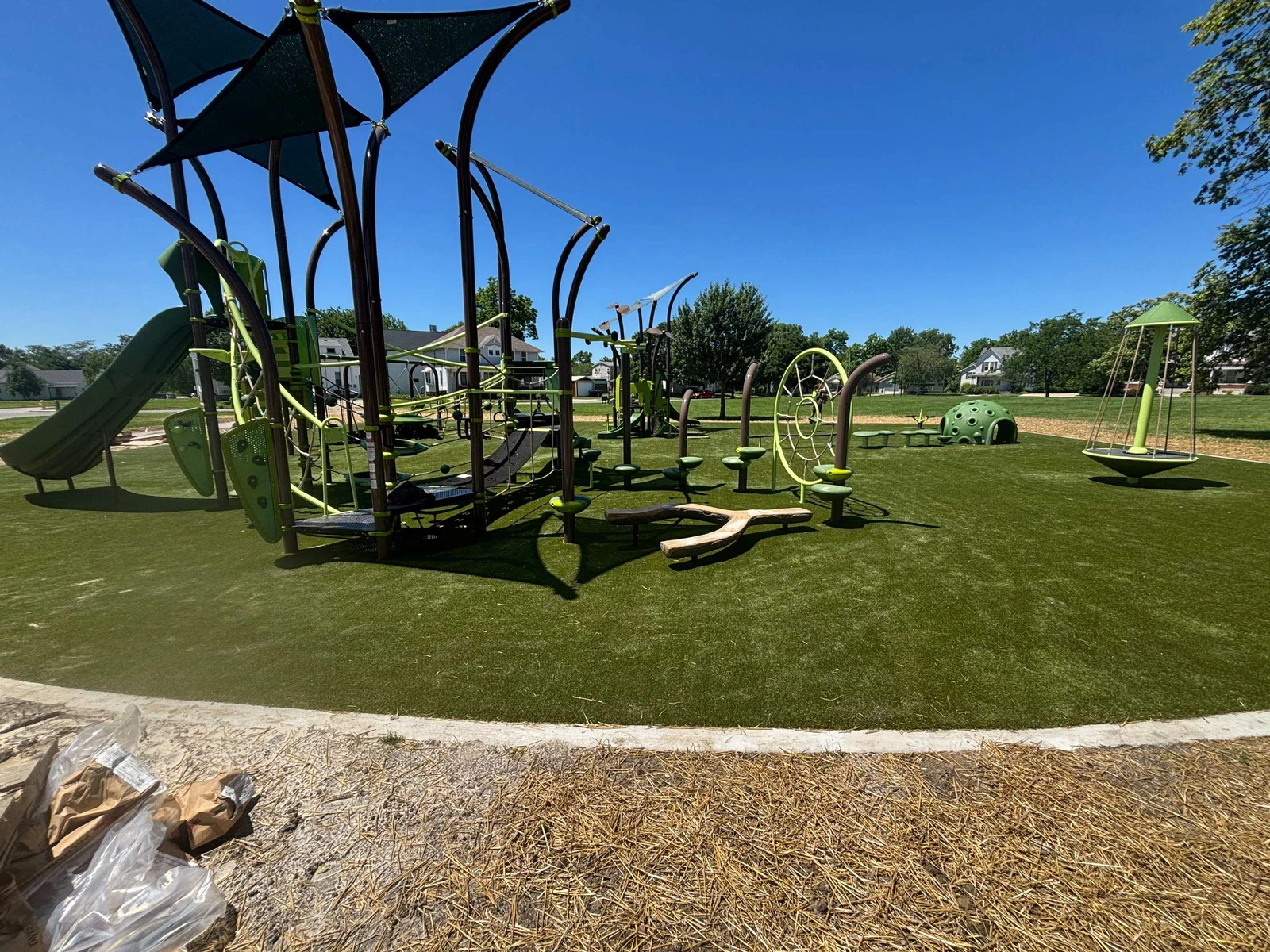 Featured image for “Hanna Homestead Park Playground Grass Installation”