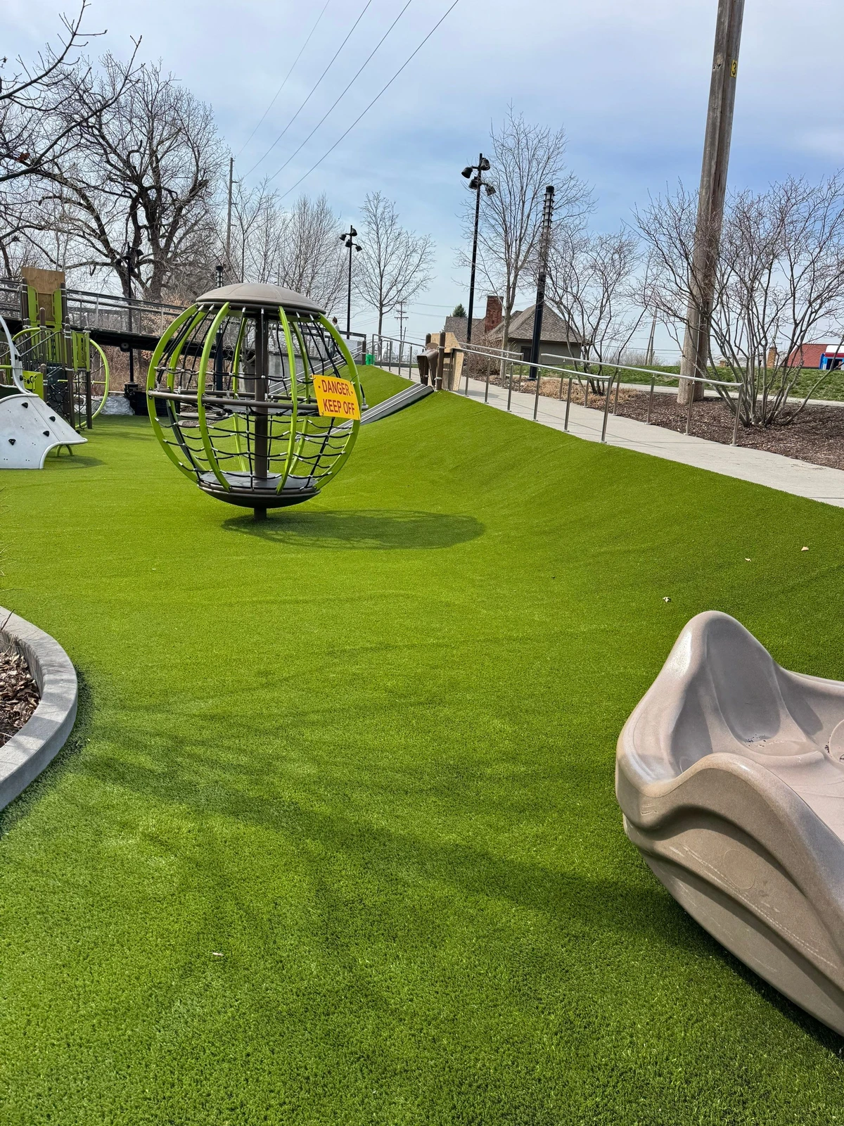 Playground Grass™ artificial turf installation at Promenade Park, Fort Wayne, Indiana
